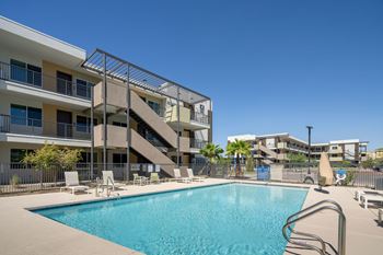 Swimming pool with built-in bench seating